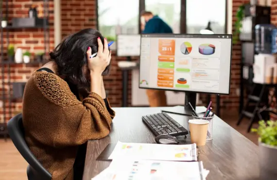 Marketing team reviewing a PPC campaign audit checklist