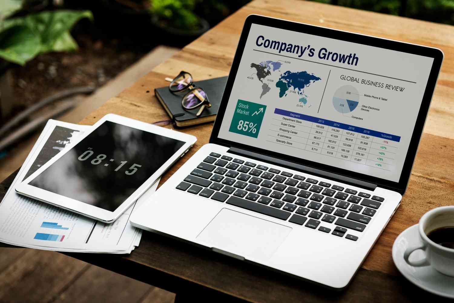 Small business owner in Noida reviewing SEO growth on a laptop